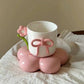 Elegant Floral Ceramic Coffee Cup with Bow & Display Stand